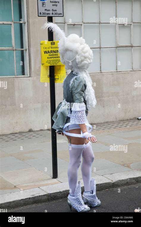 England London The Annual Gay Pride Parade Drag Queen Standing Next To No Parking Sign Stock