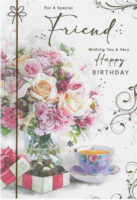 A Birthday Card With Flowers And A Tea Cup