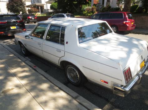 Oldsmobile Cutlass Supreme Brougham Door White Sedan