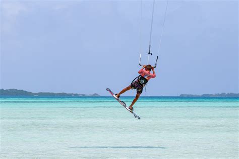 Boy on a Kite Surfing Board Soaring in the Air over Sea Surface · Free ...