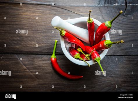 Red Hot Chilli Peppers On Dark Background With Copyspace Stock Photo Alamy