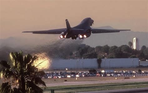 B-1B Lancer Takeoff in Afterburner Photograph by Erik Simonsen - Pixels