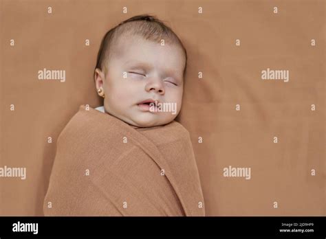 Newborn Baby Girl Sleeping On A Blanket Stock Photo Alamy