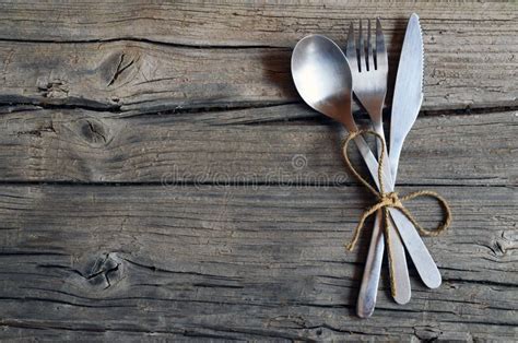 Cutlery Setforkspoon And Knife On Rustic Wooden Tablecutlery On Old