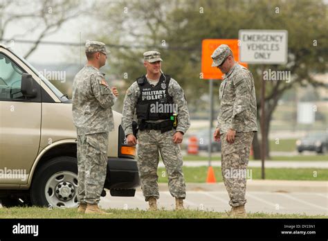 Military police in camouflage uniforms on duty near the main gate of Stock Photo: 68273661 - Alamy