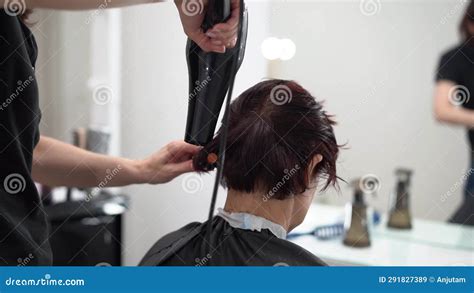 Short Haircut For Women S Hair An Elderly Woman In A Beauty Salon