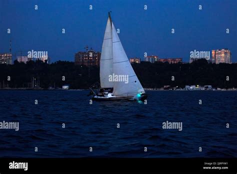 Sailing Yacht At Night Stock Photo Alamy