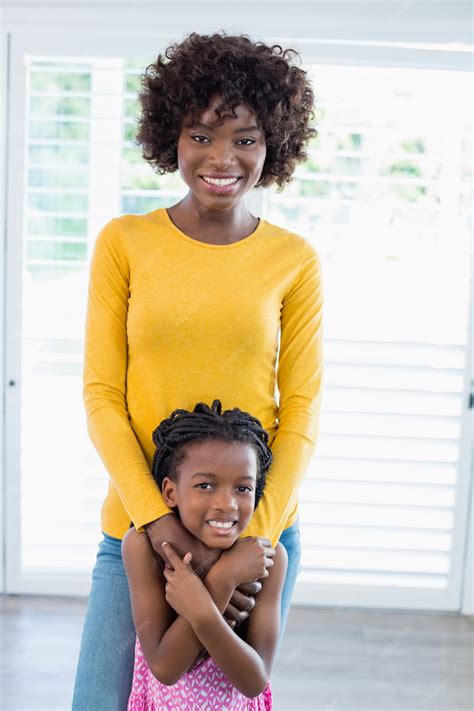 Premium Photo Portrait Of Mother Embracing Her Daughter