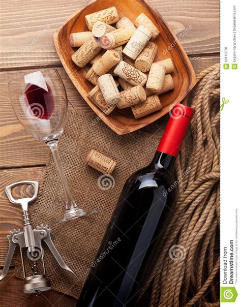 Red Wine Bottle Wine Glass Bowl With Corks And Corkscrew Stock Photo