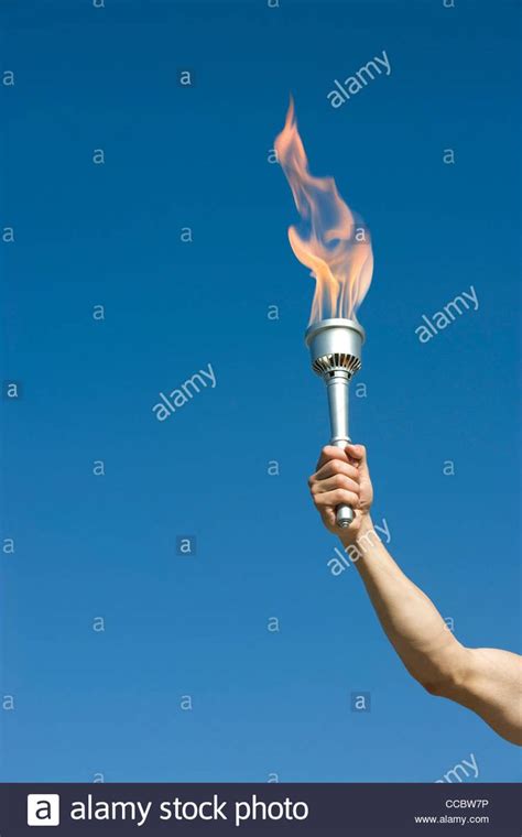 Mans Arm Holding Up Torch Stock Photo 42057898 Alamy Photo Stock