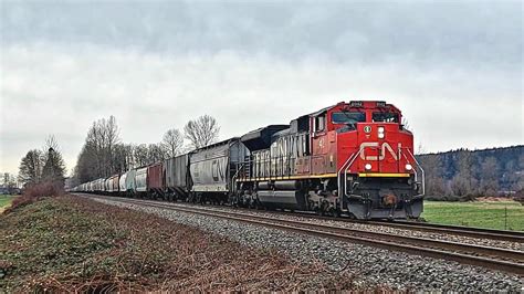 SD70M 2 Leader CN 834 Grain Train W DPU At Glen Valley British