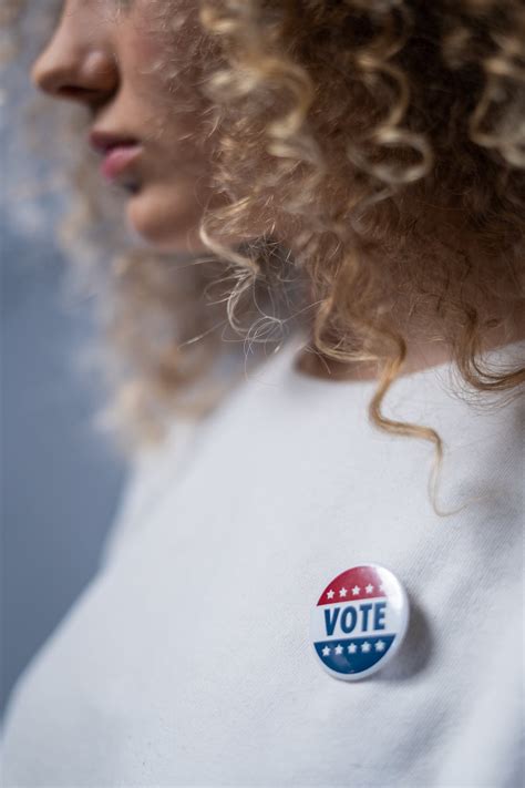 Woman With A Vote Pin · Free Stock Photo