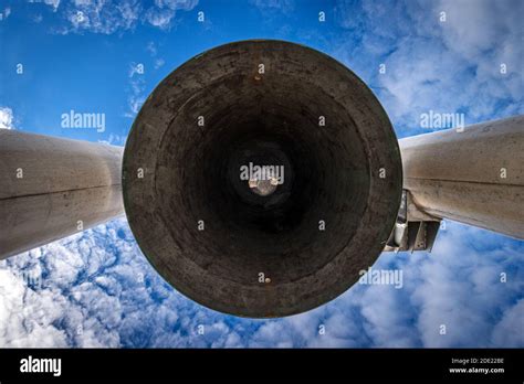 Large Bell Bell Of The Peace With Clapper On Blue Sky With Clouds