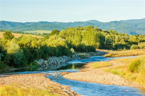 Premium Photo Clear Blue River In Mountains