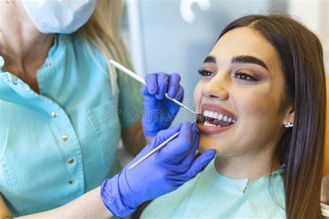 Painkiller Anesthesia Injection Dentist Examining A Patient`s Teeth In