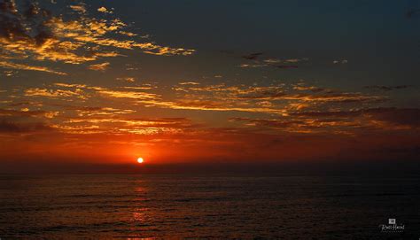 Sunset Over The Pacific Ocean By Russ Harris