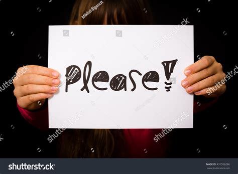 studio shot child holding  sign stock photo edit