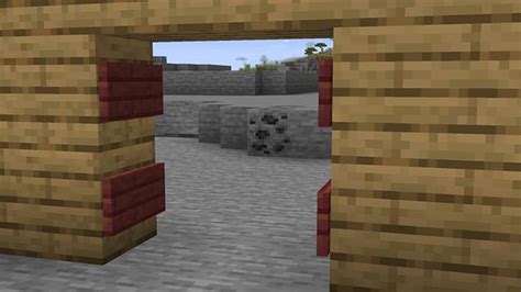 How to make a secret door using paintings in Minecraft