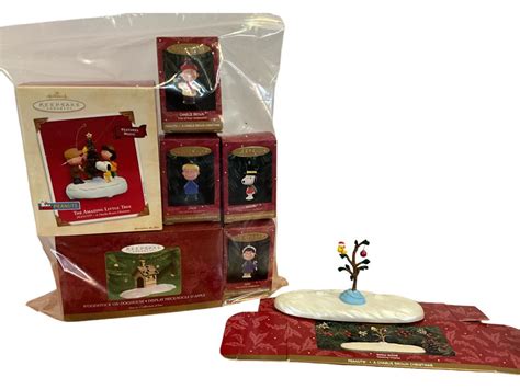 Lot - Peanuts Hallmark Christmas Ornaments and Decor