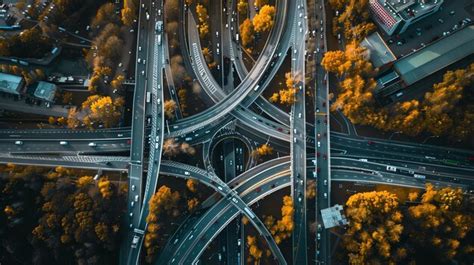 Aerial View Of A Complex Highway Interchange With Traffic And Fall