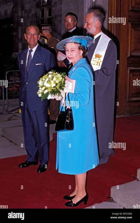 HRH Queen Elizabeth II With HRH The Duke Of Edinburgh Leaving The