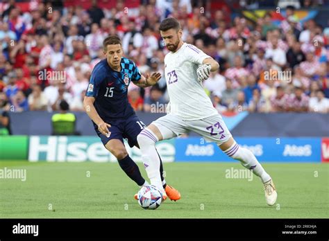 Spain Goalkeeper Unai Simon Mario Pasalic Of Croatia Left During The