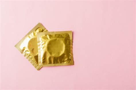 Premium Photo Condom In Wrapper Pack