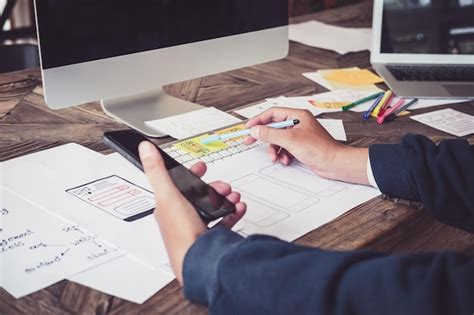 Premium Photo Midsection Of Businessman Working On Table