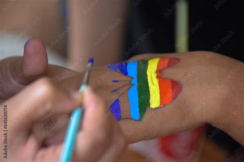 Rainbow Gay Pride Tattoo Design On Arm. LGBTQ community and movement of ...