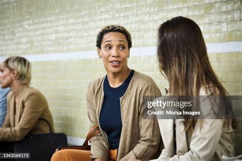 1321 Two People Talking Subway Stock Photos High Res Pictures And