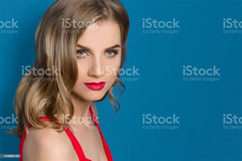 Beauty Portrait Of Young Blonde Woman With Bright Red Lips Blue Eyes In