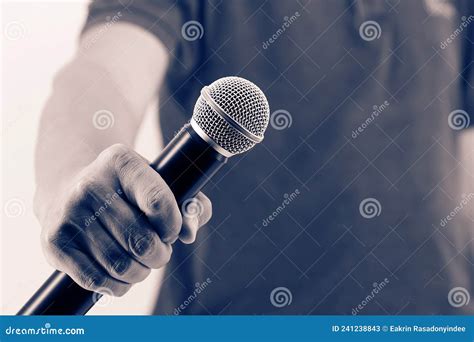 Close Up Hand Holding Microphone for Speaker Speech Presentation Stage ...