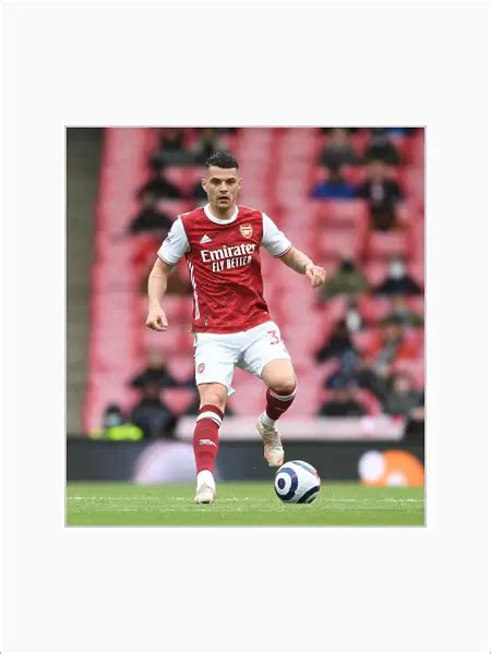 Mounted Print Of Granit Xhaka In Action Arsenal Vs Brighton Hove