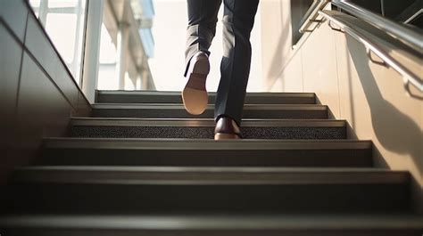 Premium Ai Image A Person Is Walking Up Some Stairs