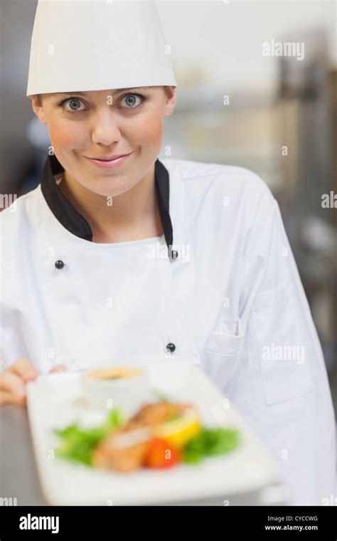 Smiling Chef Behind Dinner Plate Stock Photo Alamy