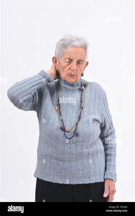 Senior Woman With Neck Pain On White Background Stock Photo Alamy