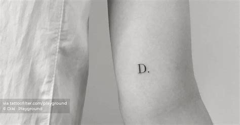 Letter D Tattoo Located On The Inner Arm