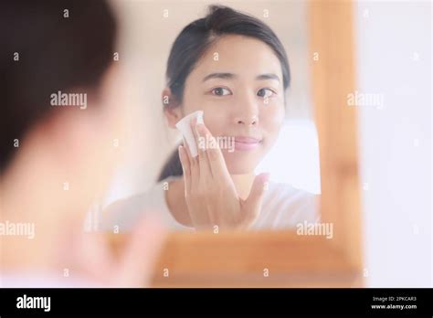 Woman Taking Care Of Skin Stock Photo Alamy