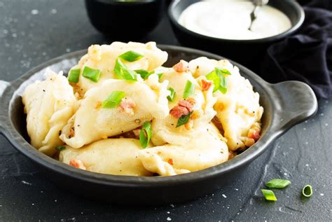 Dumplings With Potatoes In Onion And Bacon Sauce Stock Image Image