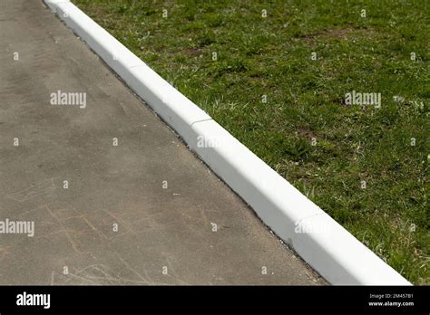 Painted Curb White Curb On Road Landscaping In City White Paint