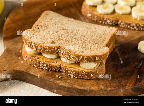 Homemade Healthy Peanut Butter Banana Sandwich on Wheat Bread Stock ...