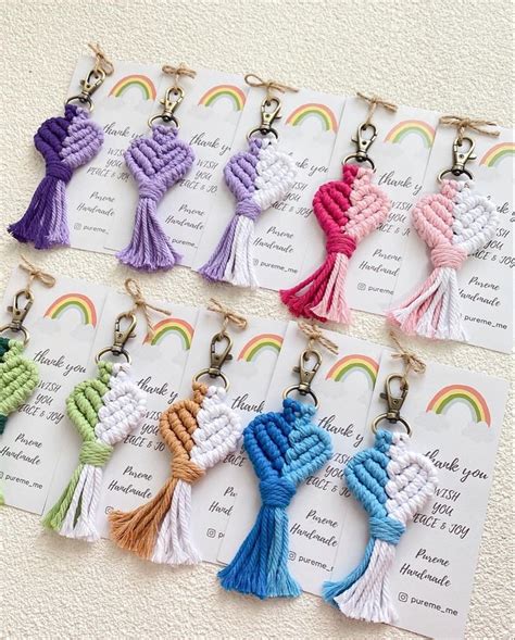 Six Key Chains With Tassels On Them Are Shown In Different Colors And Sizes