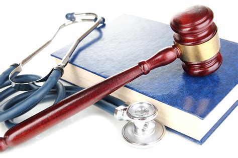 Premium Photo Medicine Law Concept Gavel And Stethoscope On Book Close Up