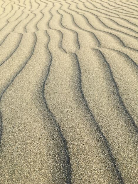 Premium Photo Full Frame Shot Of Tire Tracks On Sand