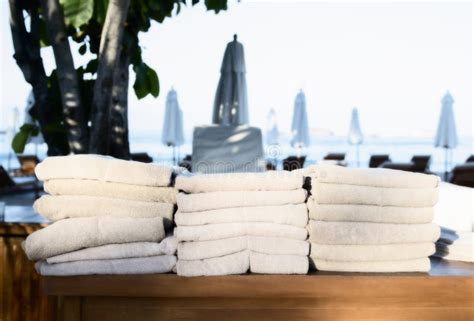 Folded Beach Towels On A Wooden Shelf At A Beach In Mexico Stock Photo