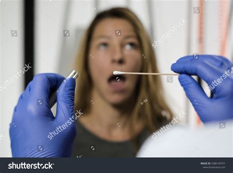 Taking Saliva Buccal Swab Test Probe Stock Photo 1688199757 | Shutterstock