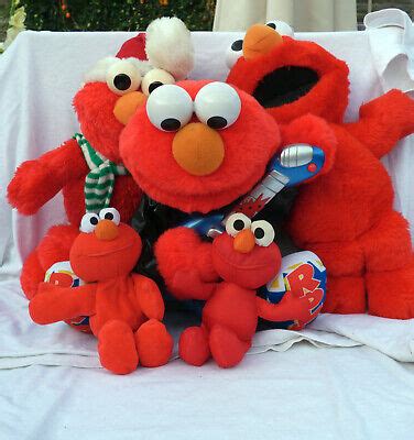 Elmo Toys Multi-Listing. Tickle Me Elmo & Rock N Roll Elmo work - see ...