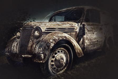 Royalty Free Photo Photo Of Rusty Vintage White Car On Green Grass