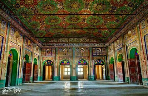 The Inside Of An Ornately Decorated Building With Doors And Stained