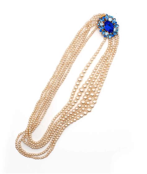 Multi Strand Faux Pearl Necklace With Decorative Blue Clasp Gadelles